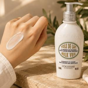لوسیون بدن شیر بادام لوکسیتان مدل میلک ویل 240 میلی‌لیترLOccitane Almond Milk Veil Moisturizing  Smoothing Body Lotion 240ml